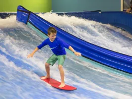 a boy on a flowboard