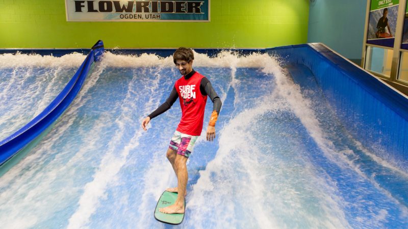 a man flowboarding at Flowrider