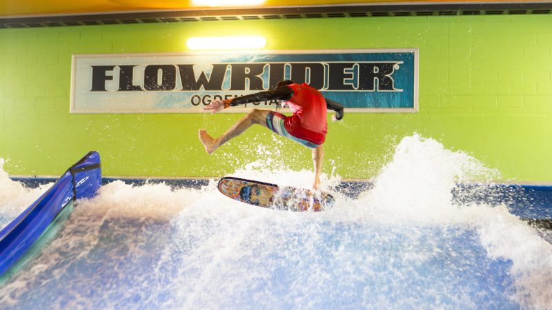 a person jumping on a flowboard